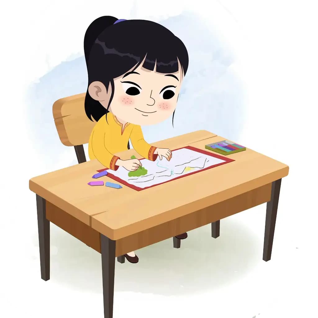 A cute Indian girl is sitting at a table with some crayons and coloring on the paper aka lilly