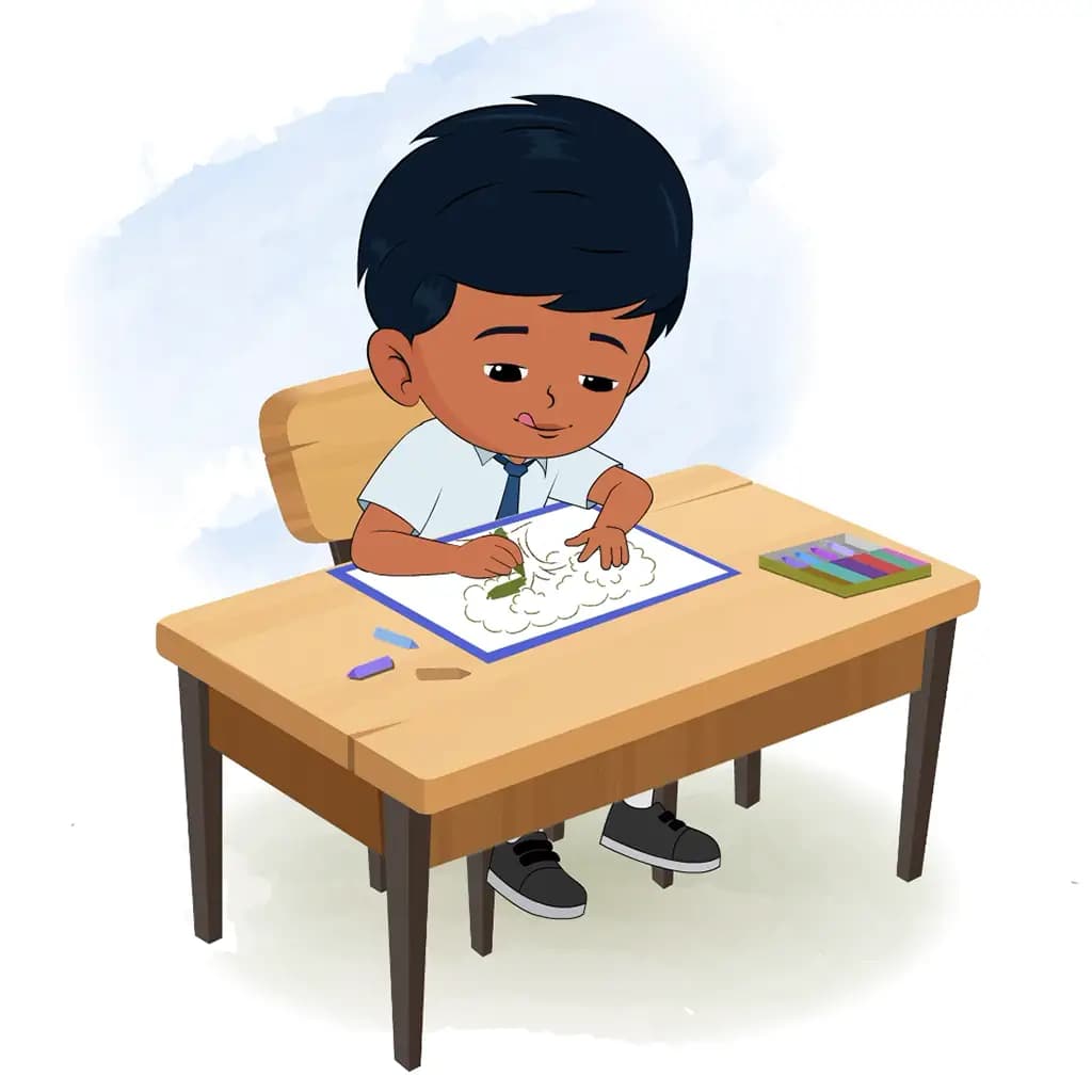 An Indian school boy is sitting at a table with some crayons and colouring on the paper aka arun