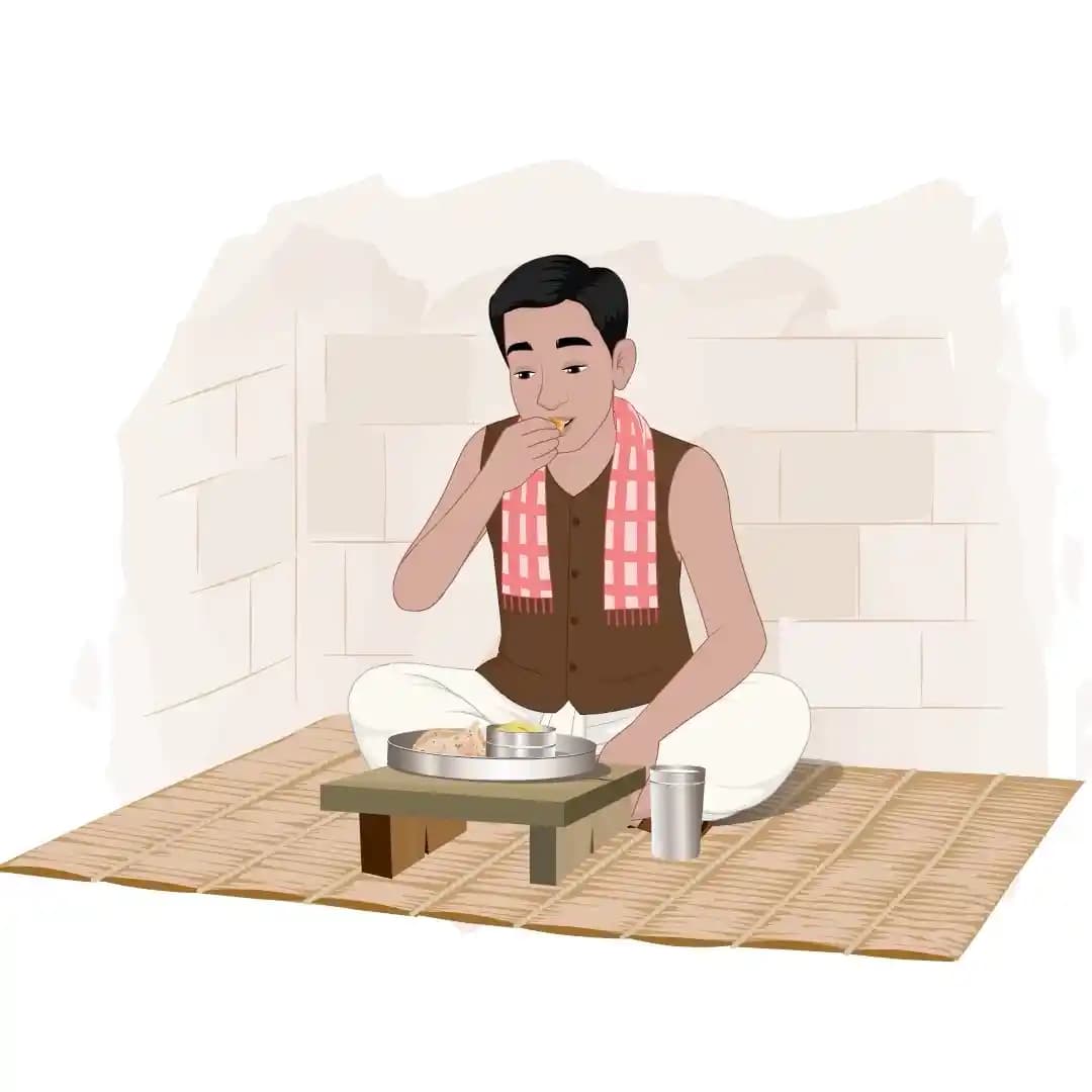 Front view of an Indian poor man sitting cross-legged on a mat, eating a meal from a low table with a plate and glass beside him AKA Ram charan