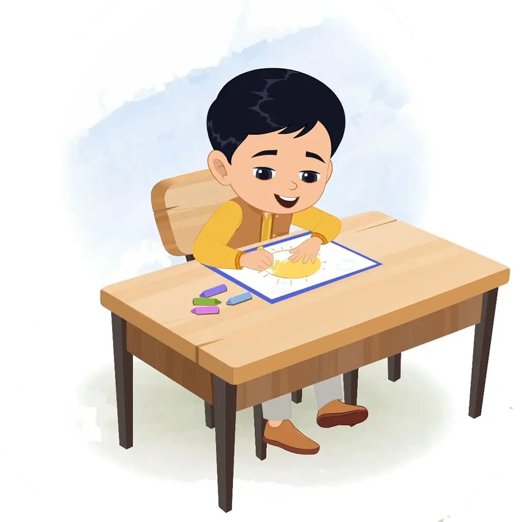 An Indian boy is sitting at a table with some crayons and colouring on the paper aka ishaan
