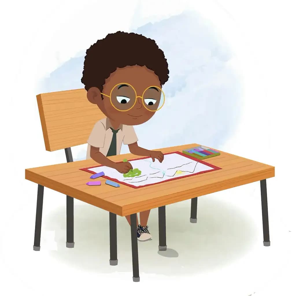 An African school boy is sitting at a table with some crayons and colouring on the paper aka shree