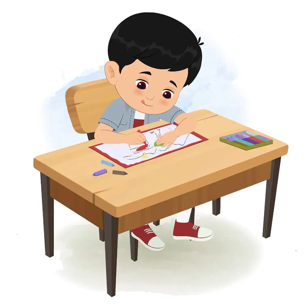 A little Indian boy is sitting at a table with some crayons and coloring on the paper aka aarav